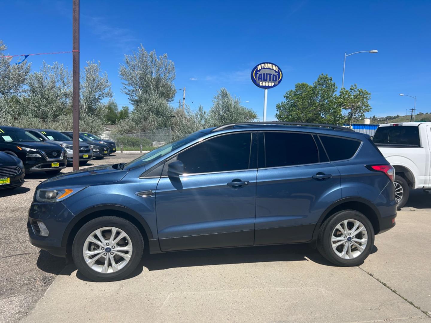 2018 BLUE Ford Escape SEL (1FMCU9HD6JU) with an L4, 1.5L engine, Automatic transmission, located at 3030 CY Ave, Casper, WY, 82604, (307) 265-3830, 42.827816, -106.357483 - Photo#0